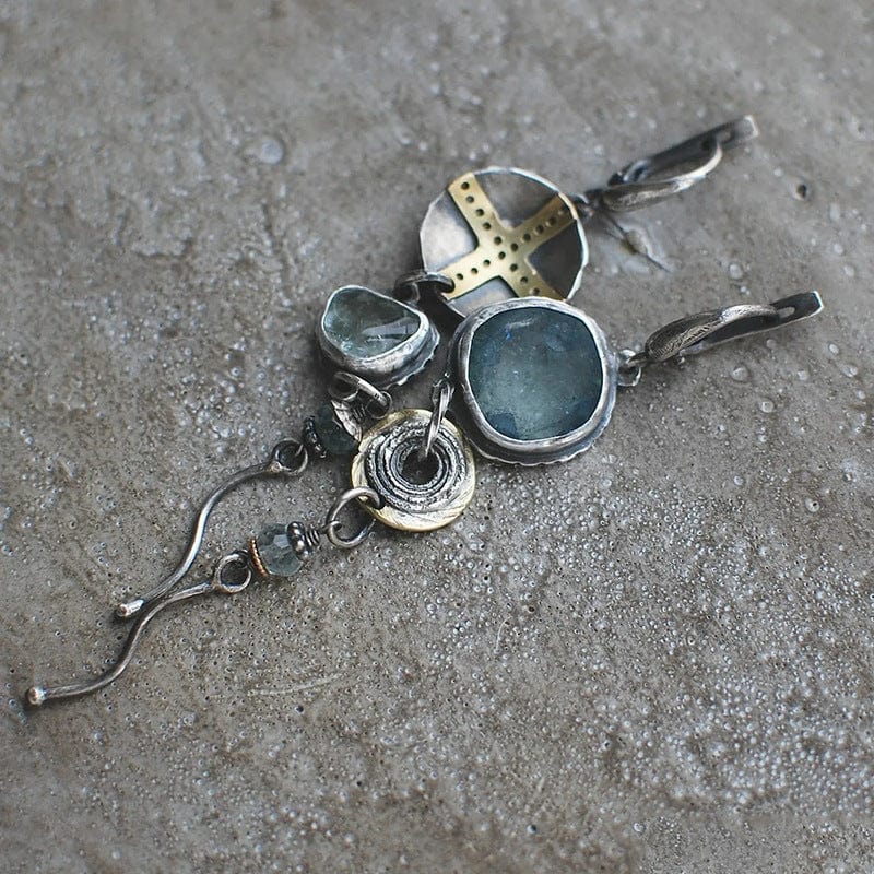 Blue Stone Cross Earrings" can be rewritten as "Blue Gemstone Cross Earrings.