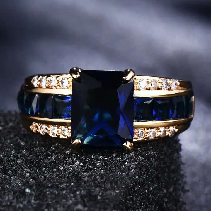 Blue Horizon Gold Ring" can be rewritten as "Gold Ring with Blue Horizon Gem.