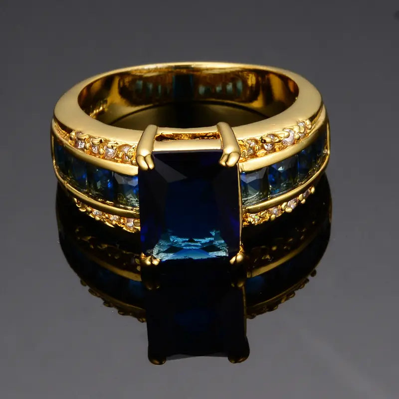 Blue Horizon Gold Ring" can be rewritten as "Gold Ring with Blue Horizon Gem.