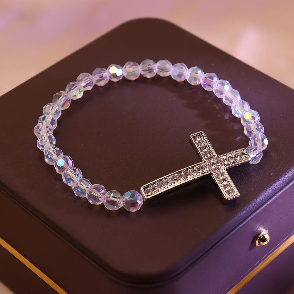 Shimmering White and Blue Peacock Cross Bracelet: A Symbol of Faith