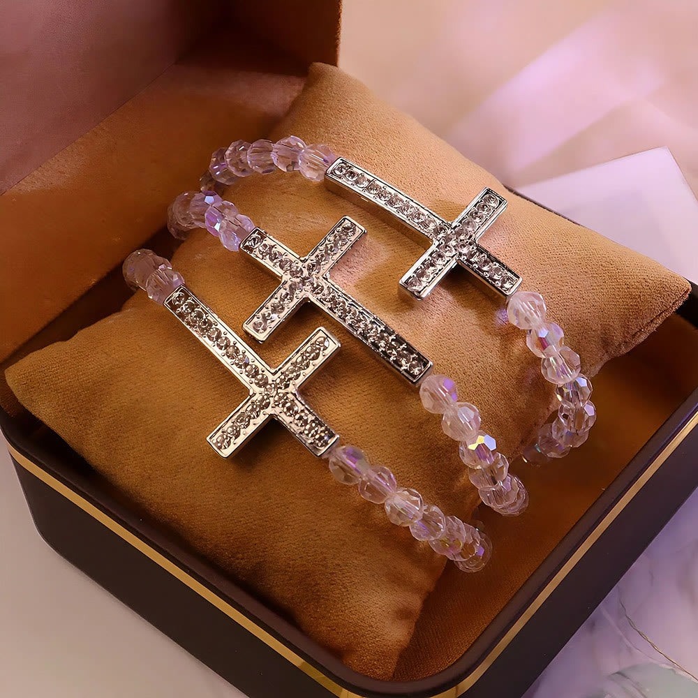 Shimmering White and Blue Peacock Cross Bracelet: A Symbol of Faith