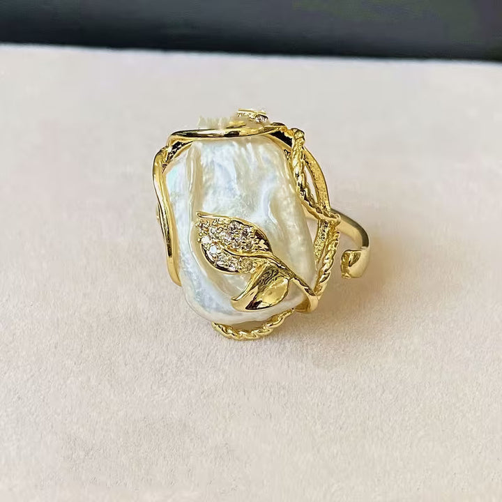 Natural Freshwater Pearl Engagement Ring" can be rewritten as "Freshwater Pearl Engagement Ring.