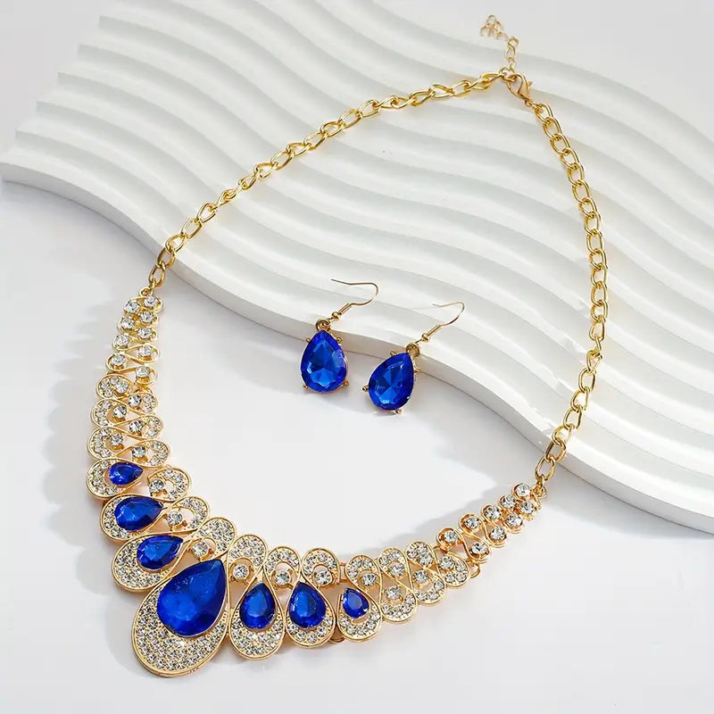 Celestial Sapphire Gold Jewelry Set" can be rewritten as "Celestial Sapphire Gold Jewelry Collection.