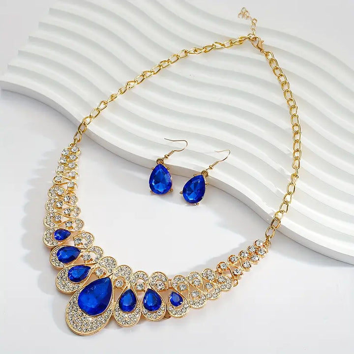 Celestial Sapphire Gold Jewelry Set" can be rewritten as "Celestial Sapphire Gold Jewelry Collection.