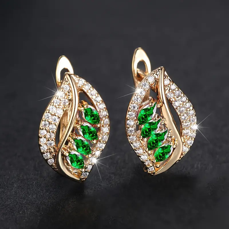 Emerald Breeze Earrings" can be translated and rewritten as "Emerald Breeze Drop Earrings.
