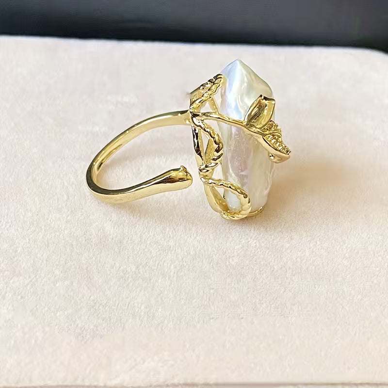 Natural Freshwater Pearl Engagement Ring" can be rewritten as "Freshwater Pearl Engagement Ring.