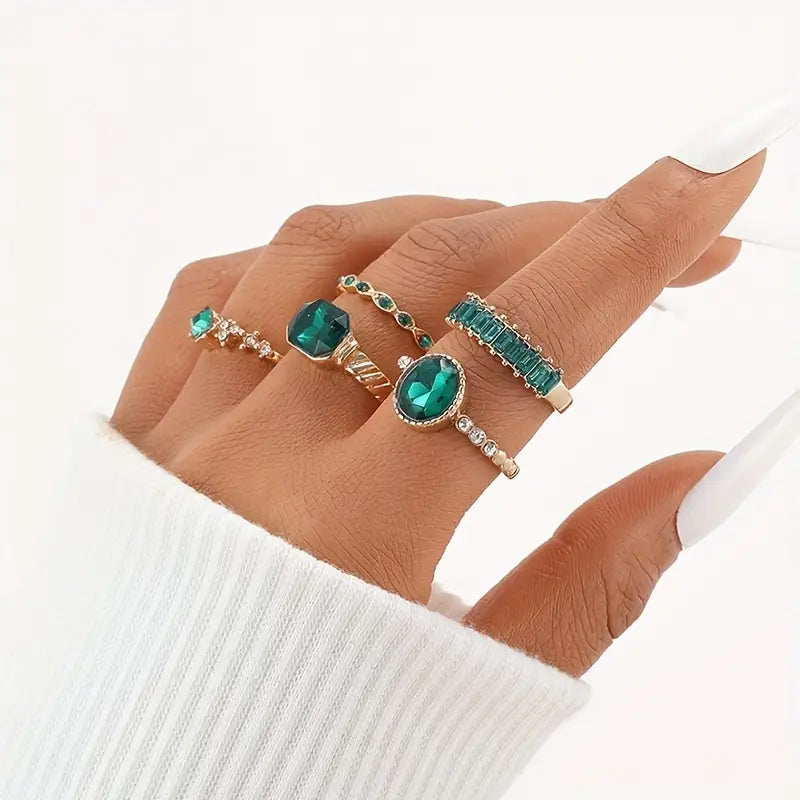 Emerald Tsarina Gold Ring Set" can be rewritten as "Tsarina Emerald Gold Ring Set.