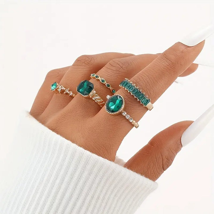 Emerald Tsarina Gold Ring Set" can be rewritten as "Tsarina Emerald Gold Ring Set.