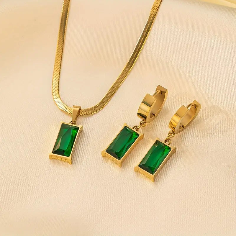 Carina Gold Earrings with Emerald Stone