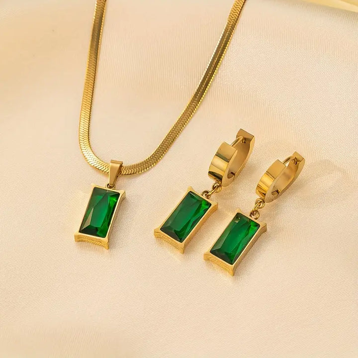 Carina Gold Earrings with Emerald Stone