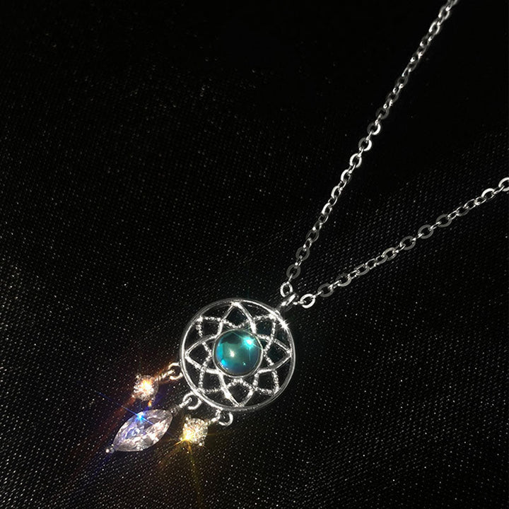 Silver Moon Crystal Dreamcatcher Necklace" can be rewritten as "Silver Dreamcatcher Necklace with Moon Crystal.