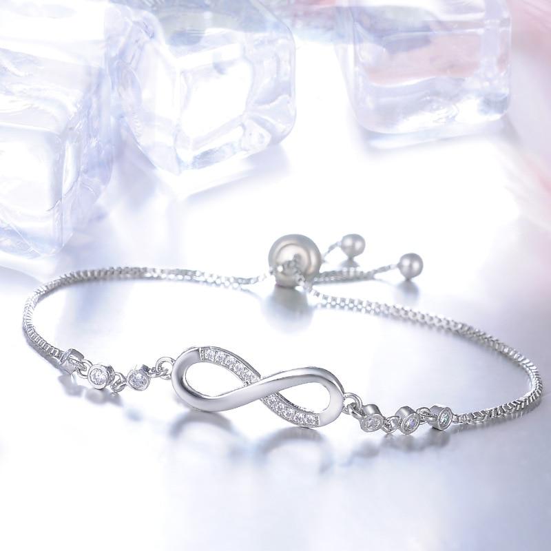 Adjustable Silver Infinity Bracelet" can be rewritten as "Adjustable Silver Infinity Charm Bracelet.