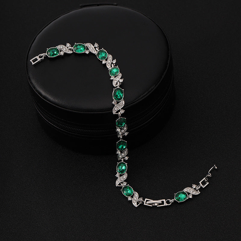 Emerald Jade Bracelet" can be rewritten as "Elegant Emerald Jade Bracelet.