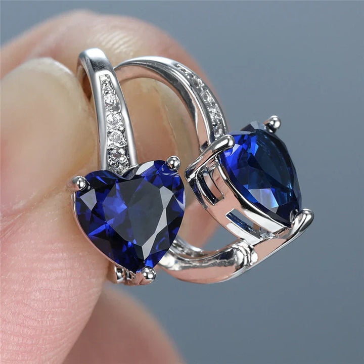 Celestial Moon Earrings" can be rewritten as "Lunar Charm Earrings.