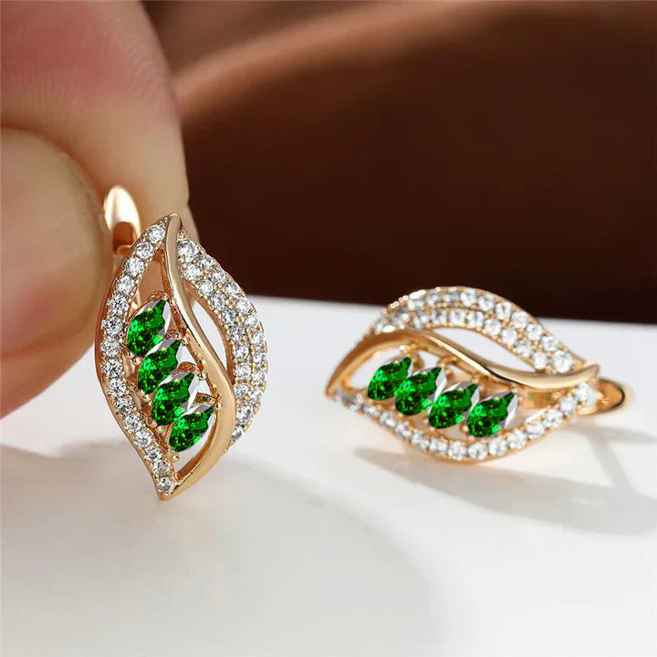 Emerald Leaf Earrings" can be rewritten as "Emerald Leaf Drop Earrings.