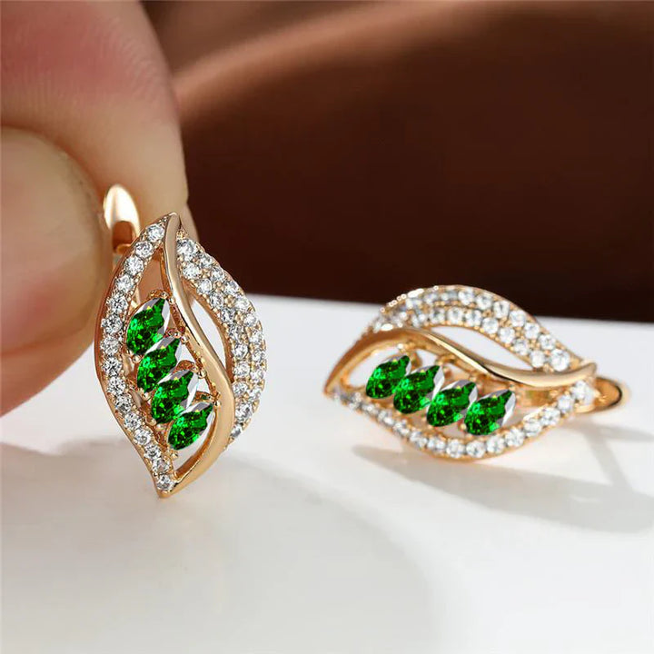 Emerald Breeze Earrings" can be translated and rewritten as "Emerald Breeze Drop Earrings.