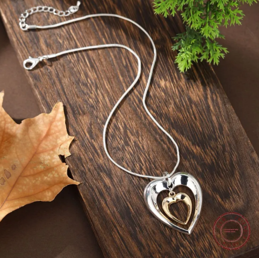 Two-Tone Hollow Heart Pendant Necklace
