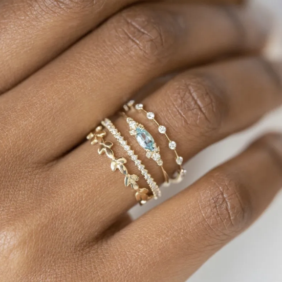 Square Zircon Ring with Four Diamonds" can be rewritten as: 

"Square Zircon Ring Featuring Four Diamonds