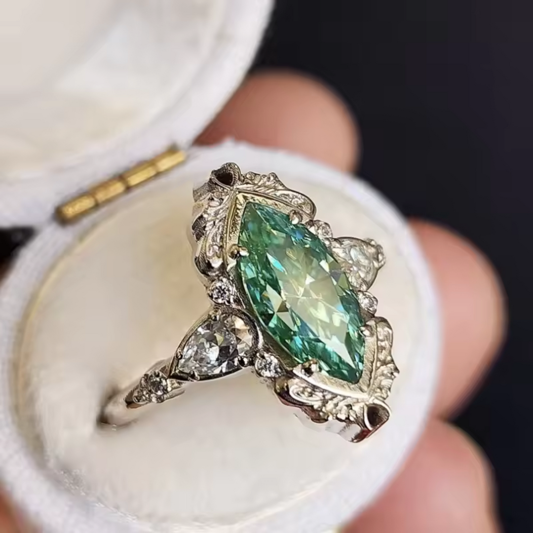 Elegant Marquise Emerald Ring