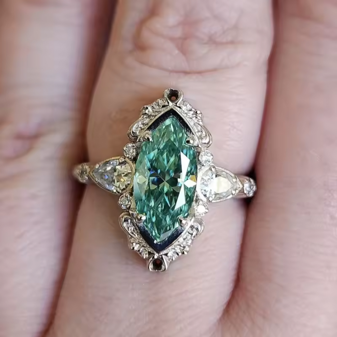 Elegant Marquise Emerald Ring