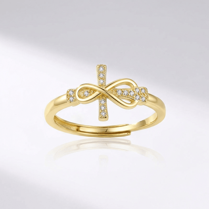 Adjustable Silver Cross and Bow Ring