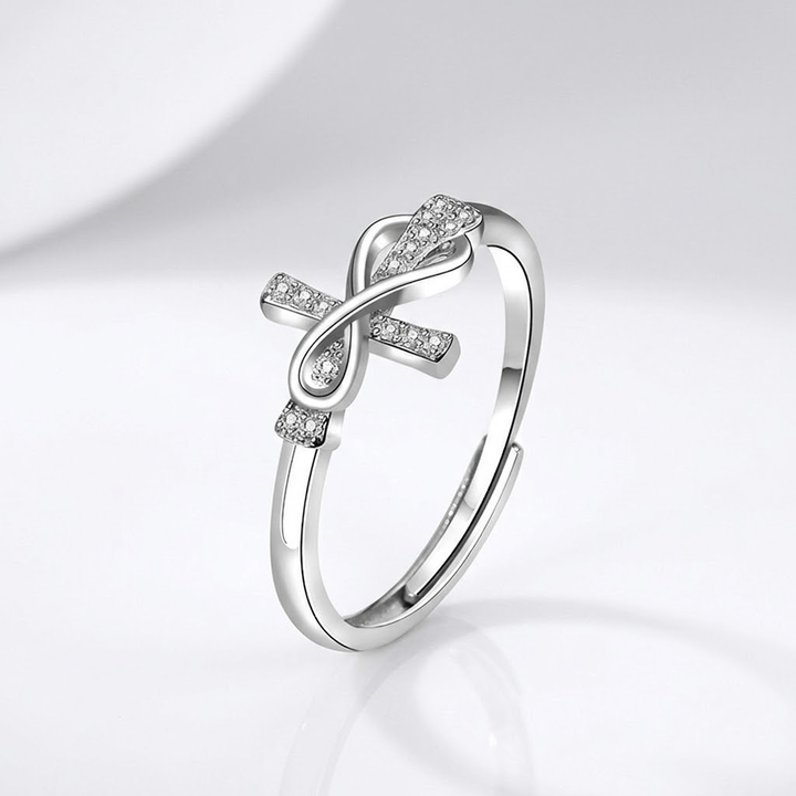 Adjustable Silver Cross and Bow Ring