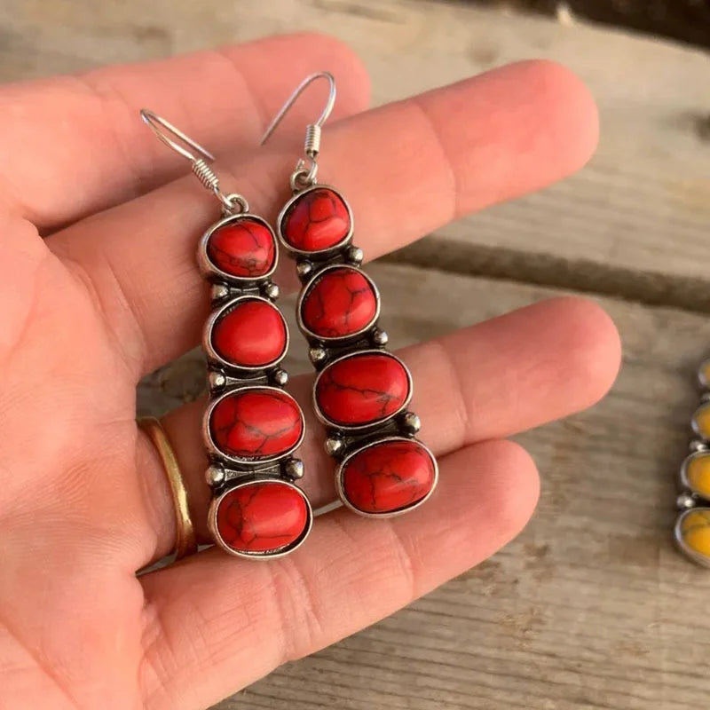 Vintage Red Turquoise Earrings" can be rewritten as "Retro Red Turquoise Earrings.