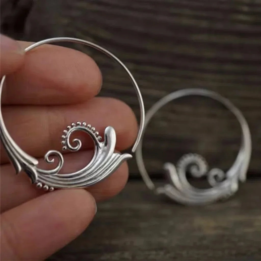 Silver Wave Earrings" can be rewritten as "Elegant Silver Wave Earrings.