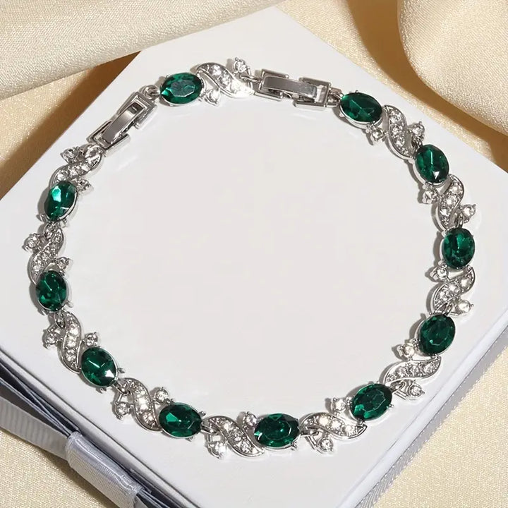 Emerald Jade Bracelet" can be rewritten as "Elegant Emerald Jade Bracelet.