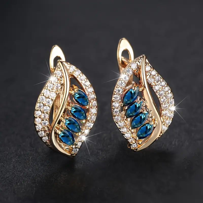 Golden Breeze Earrings" can be rewritten as "Golden Breeze Hoops.