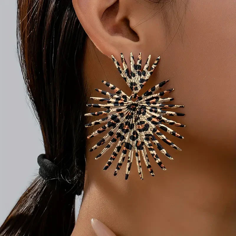 Black Gold Spine Earrings" can be rewritten as "Black Gold Spine Drop Earrings.