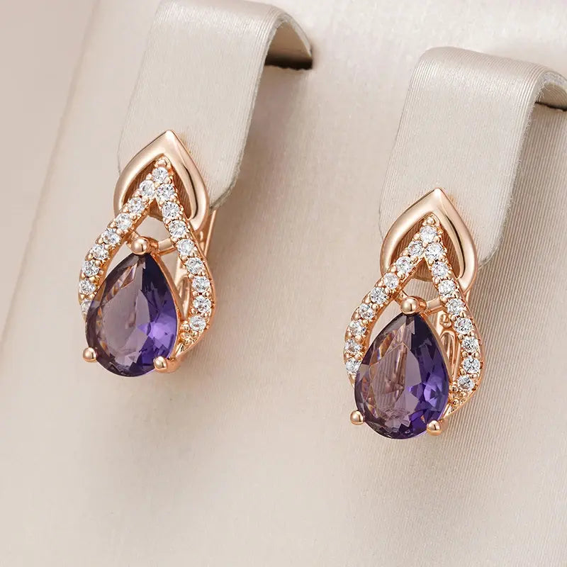 Chic Gold Earrings with Dazzling Purple Crystals