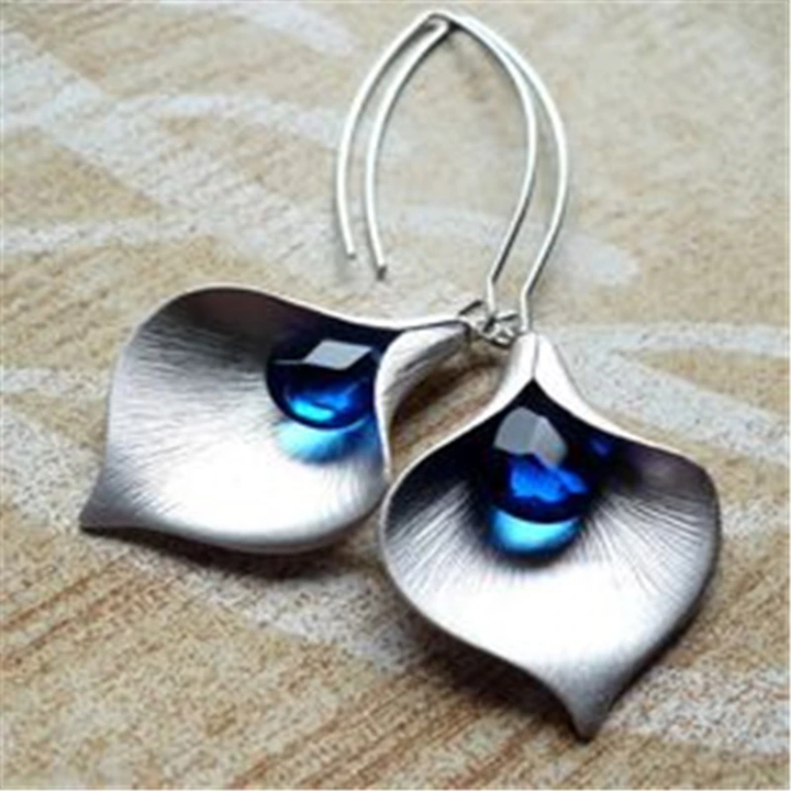 Silver Lotus Earrings with Blue Crystals
