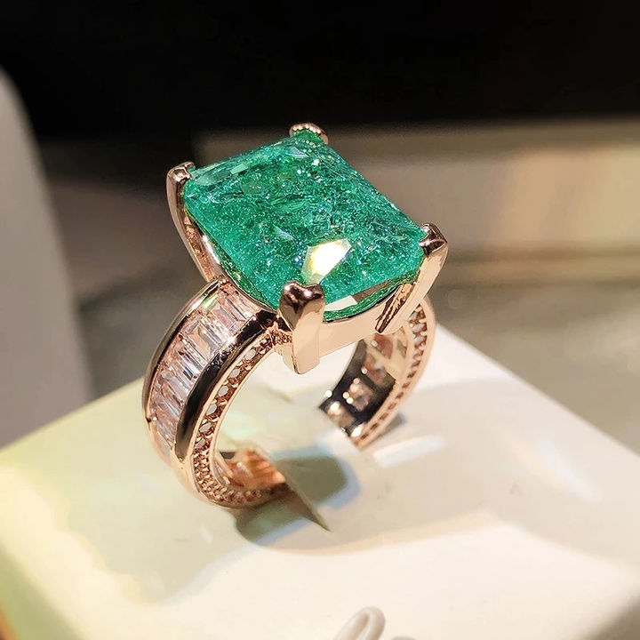 Gold Ring with Vibrant Green Gemstone