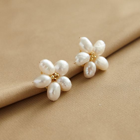 Chic Pearl Earrings with White Petal Accents