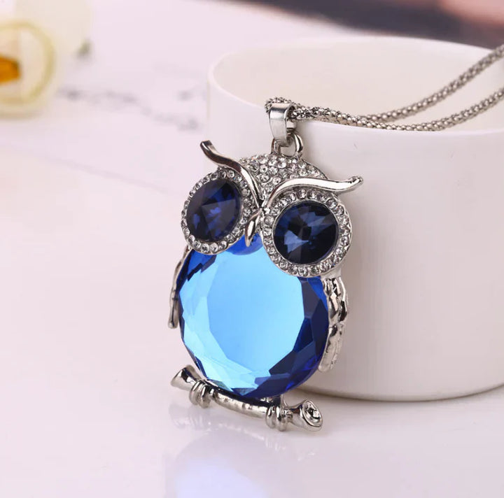 Moonstone Owl Pendant Necklace" can be rewritten as "Owl Pendant Necklace with Moonstone.