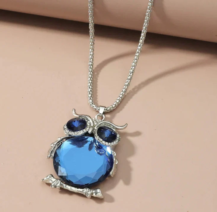 Moonstone Owl Pendant Necklace" can be rewritten as "Owl Pendant Necklace with Moonstone.