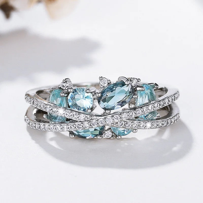 Silver Cross Ring with Blue Gemstone
